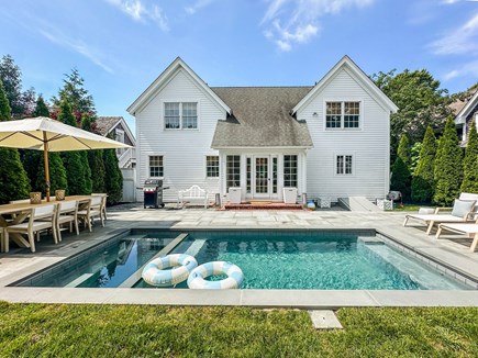 Edgartown Martha's Vineyard vacation rental - Rear view of heated pool/spa and patio with outdoor seating
