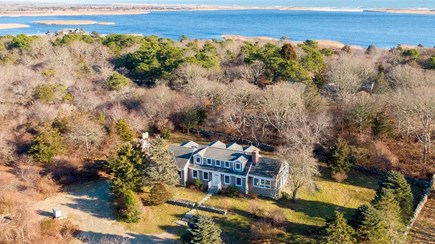 Chilmark Martha's Vineyard vacation rental - Birdseye view of the home, with the Chilmark Pond behind it.
