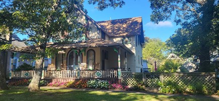 Oak Bluffs, Gingerbred Cottages - MVCMA Martha's Vineyard vacation rental - Fenced yard with garden, new Weber Grill, brick patio and table.