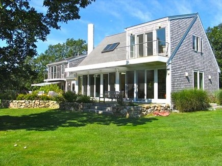 Edgartown Martha's Vineyard vacation rental - Back of the house with seating, look at those windows!