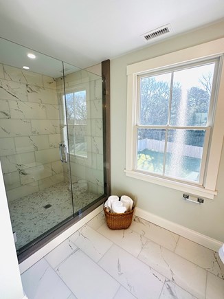 Oak Bluffs Martha's Vineyard vacation rental - 2nf-floor primary bath with double sinks and tiles shower.