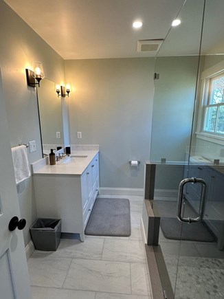 Oak Bluffs Martha's Vineyard vacation rental - 1st floor primary en suite bath with tiles shower.