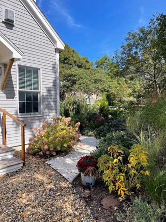 Edgartown (Katama area) Martha's Vineyard vacation rental - Seashell walkway to private side deck with flower garden