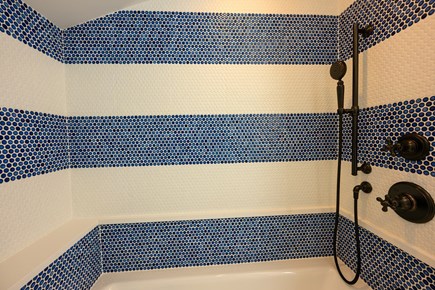 Oak Bluffs Martha's Vineyard vacation rental - Fun striped tile design and shower-tub combo.