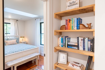 Edgartown Martha's Vineyard vacation rental - Book shelf in hallway on second floor