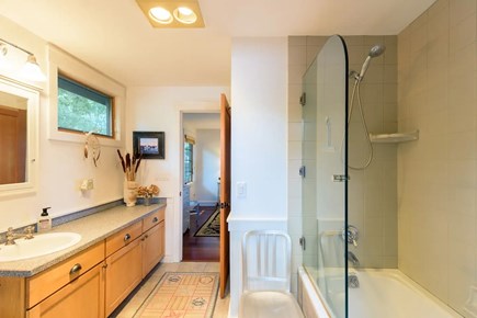 Oak Bluffs Martha's Vineyard vacation rental - Master bathroom with tub/shower and outdoor shower off bathroom