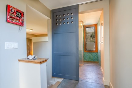 Oak Bluffs - East Chop Martha's Vineyard vacation rental - Sliding door to social bathroom and stairwell to second bedroom.