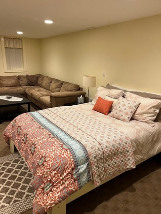 Edgartown  Martha's Vineyard vacation rental - Ground level suite with queen bed and sectional sofa.