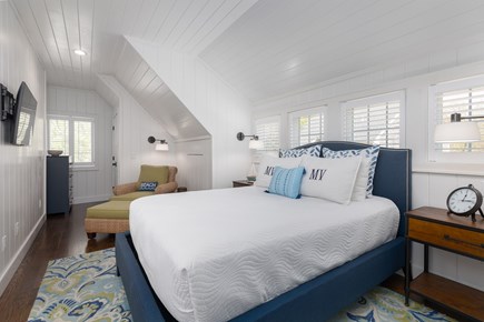 Edgartown, Island Grove Martha's Vineyard vacation rental - Guest Apartment Bedroom with TV and Barn Doors