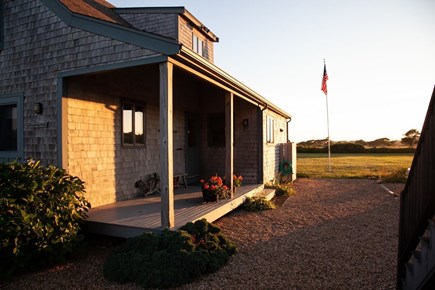 Edgartown Martha's Vineyard vacation rental - Sunset at porch by driveway.  Faces north.