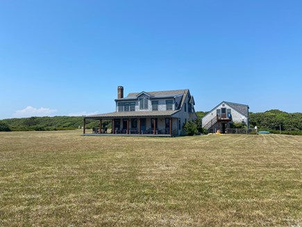 Edgartown Martha's Vineyard vacation rental - Large porch and garage guest quarters with meadow and beach views