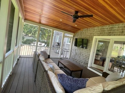 Katama-Edgartown Martha's Vineyard vacation rental - Screened porch..great spot to catch the game or Rom Com