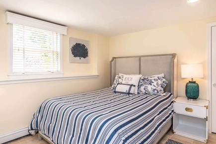 Edgartown Martha's Vineyard vacation rental - Lower-level queen suite with yard access and bath.