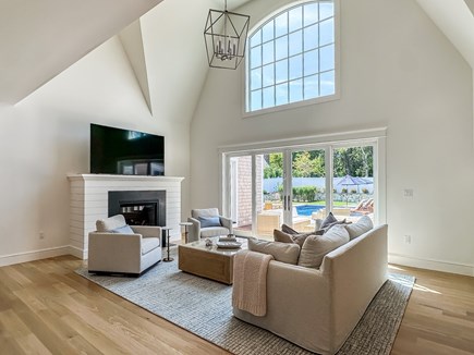 Edgartown Martha's Vineyard vacation rental - Living area w/ cathedral ceilings and doors to the back deck