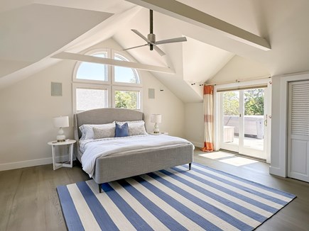 Katama-Edgartown Martha's Vineyard vacation rental - Primary bedroom with en suite and sliders to deck/hot tub