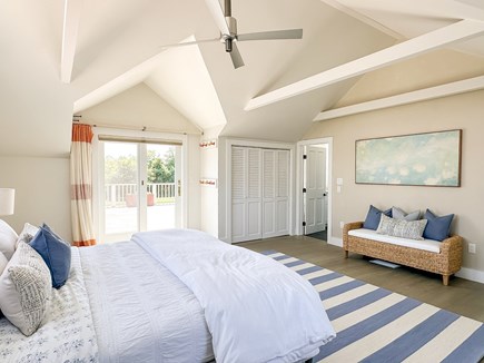 Katama-Edgartown Martha's Vineyard vacation rental - Primary bedroom with en suite and sliders to deck/hot tub