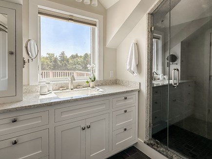 Katama-Edgartown Martha's Vineyard vacation rental - Primary bedroom with en suite and sliders to deck/hot tub