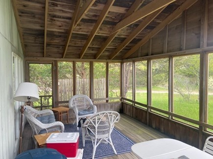 Edgartown, Chappaquiddick Martha's Vineyard vacation rental - Field House screened in porch with dining table and chiars
