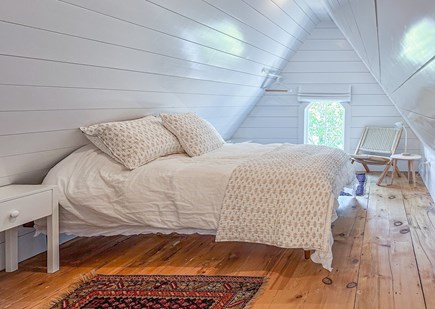 Vineyard Haven Martha's Vineyard vacation rental - Cozy attic bedroom with rustic charm and natural light