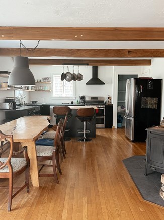 Oak Bluffs Martha's Vineyard vacation rental - Kitchen and dining table (plus wood stove)