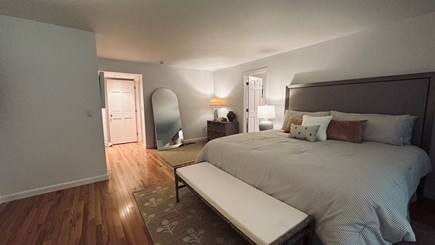 Oak Bluffs, Martha's Vineyard Martha's Vineyard vacation rental - King-size primary bedroom with an ensuite bathroom & porch