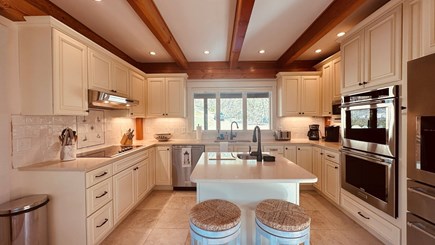 Chilmark Martha's Vineyard vacation rental - Cream cabinetry and quartz countertops in the kitchen