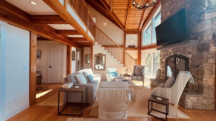Chilmark Martha's Vineyard vacation rental - Living room with vaulted ceiling, stone fireplace & comfy seats
