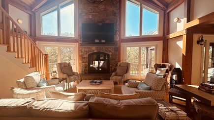 Chilmark Martha's Vineyard vacation rental - Wall mounted large tv in living room with views of the outside