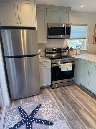 Edgartown, Guest House Martha's Vineyard vacation rental - Kitchen area leading to the deck