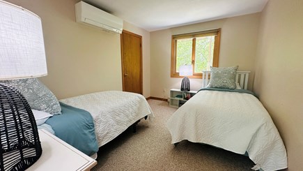 Edgartown Martha's Vineyard vacation rental - A pair of twin beds in a downstairs bedroom near the bathroom.
