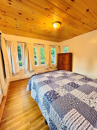 Oak Bluffs, Steps to downtown OB Martha's Vineyard vacation rental - Queen Bedroom #1, natural light & exterior door to side yard