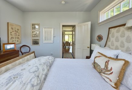 Vineyard Haven, Martha's Viney Martha's Vineyard vacation rental - Darling queen-size bedroom with an accent chair and a dresser.