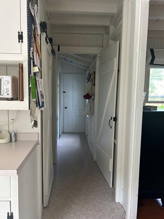 Oak Bluffs Martha's Vineyard vacation rental - Hallway to bathroom, laundry room and outdoor shower.