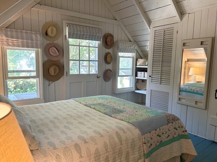 Oak Bluffs Martha's Vineyard vacation rental - Queen bedroom with closet, dresser and open shelves.