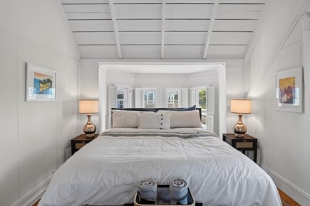 Oak Bluffs Martha's Vineyard vacation rental - Primary Upstairs Bedroom with Kind Bed and sitting area
