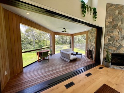 Aquinnah Martha's Vineyard vacation rental - Custom doors open seamlessly to screened in porch with fireplace