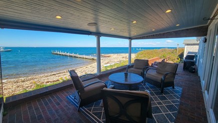 Oak Bluffs Martha's Vineyard vacation rental - Oceanfront patio with TV, speakers & grill for sunset dining