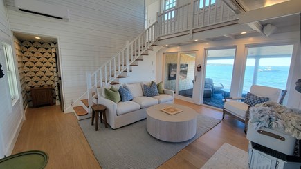 Oak Bluffs Martha's Vineyard vacation rental - Living room w/patio access and washer/dryer in alcove