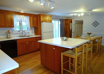 In town Edgartown!!! Martha's Vineyard vacation rental - Large kitchen area with island, dining area, slider to deck 