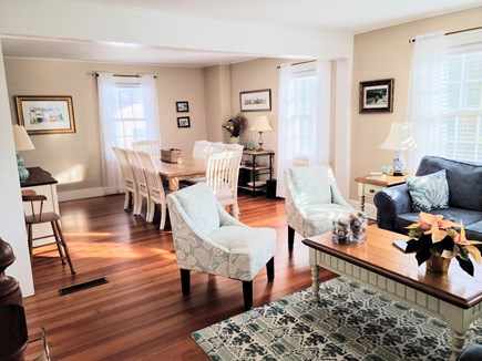Edgartown - In town Martha's Vineyard vacation rental - Living room with dining room beyond.