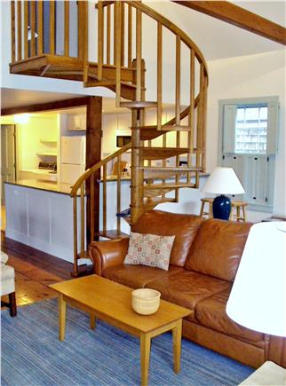 Nantucket town Nantucket vacation rental - Living/kitchen with spiral staircase to second floor.