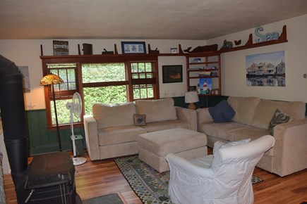 Mid-island Nantucket vacation rental - Enter into the living area with dining/kitchen to right.