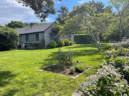 Mid-island Nantucket vacation rental - View of side yard from back of property