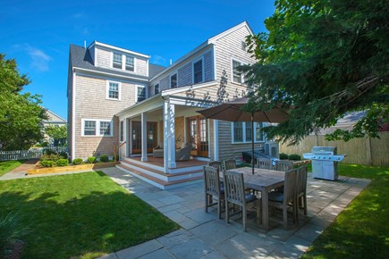 Nantucket town, Nantucket Nantucket vacation rental - Rear patio with grilles and dining set