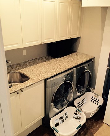Siasconset Nantucket vacation rental - Laundry, lower floor leading out to rear play area