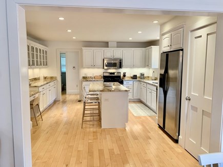 Mid-island, Surfside Nantucket vacation rental - Fully equipped kitchen with bar seating for 3 and built in desk