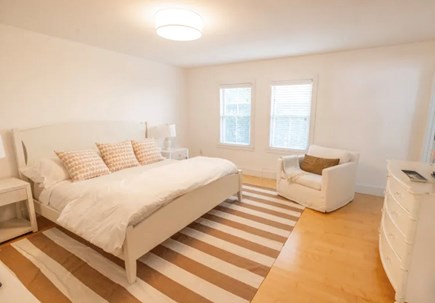 Surfside Nantucket vacation rental - First Floor king bedroom with en suite bathroom and TV