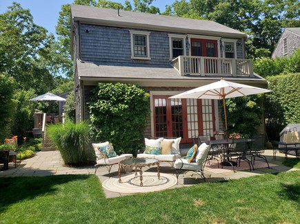 Nantucket town, Core Historic District Nantucket vacation rental - Back of House, grass yard with swing, fire pit, BBQ, bluestone