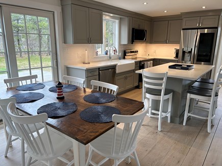 Mid-island, Nantucket Nantucket vacation rental - Kitchen and dining area.  island has 4 stools