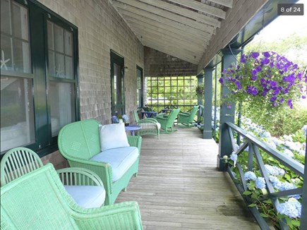 Siasconset Nantucket vacation rental - Porch has outdoor rugs and a round table & chairs for dining